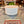 Cream carved wood coffee table