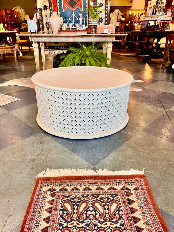 Cream carved wood coffee table