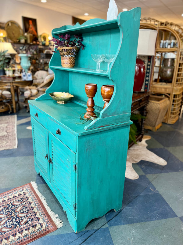 Side of vintage painted wooden hutch