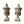 Two ornate ceramic urns with detailed designs 