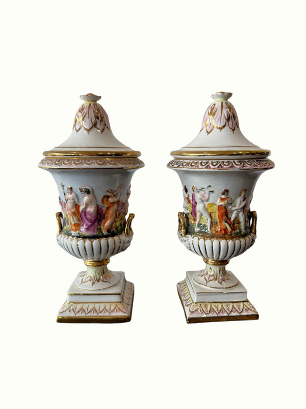 Decorative ceramic urns with figurines o