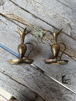 two brass candlesticks